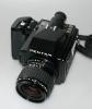 PENTAX 645 WITH 55/2.8 SMC KA, STRAP, SPEEDLIGHT AF-360FGZ, INSTRUCTIONS IN FRENCH, IN GOOD CONDITION