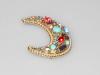 Chanel Karl Lagerfeld crescent moon brooch in gold metal decorated with cabochons and multi-colored pearls and rhinestones, superb