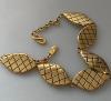 Yves Saint Laurent gold metal necklace with diamond-streaked shuttle links, vintage, very good condition