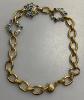 Yves Saint Laurent gold metal necklace set with green and blue stones, vintage 1970, very good condition