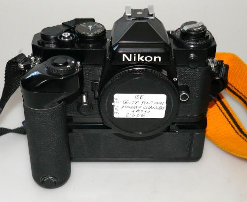 NIKON FE BLACK WITH MD-12, STRAP, IN GOOD CONDITION