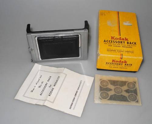 KODAK ACCESSORY BACK FOR SHEET FILM, FILM PACKS AND PLATES FOR MEDALISTS, INSTRUCTIONS, BOX, IN VERY GOOD CONDITION