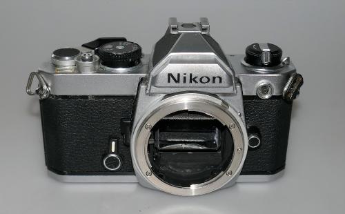 NIKON FM CHROME WITH STRAP, REVISED, IN VERY GOOD CONDITION