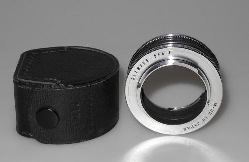 OLYMPUS PEN-F EXTENSION RING WITH BAG IN VERY GOOD CONDITION