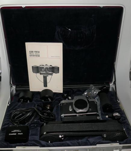 PENTAX SPOTMATIC SP F, FROM 1973, MOTOR DRIVE SYSTEM, WITH 250 EXPOSURE MAGAZINE, ACCESSORIES, CASE, INSTRUCTIONS, MINT