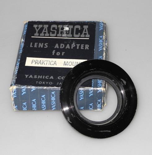 YASHICA LENS ADAPTER FOR PRAKTICA MOUNT WITH BOX IN GOOD CONDITION