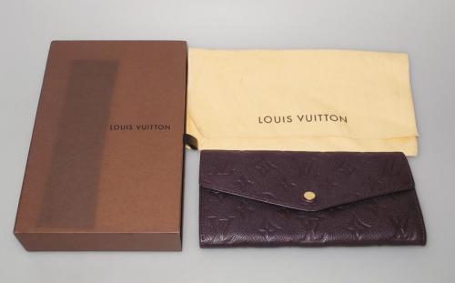 Louis Vuitton portefeuille Sarah monogram empreinte cuir prune